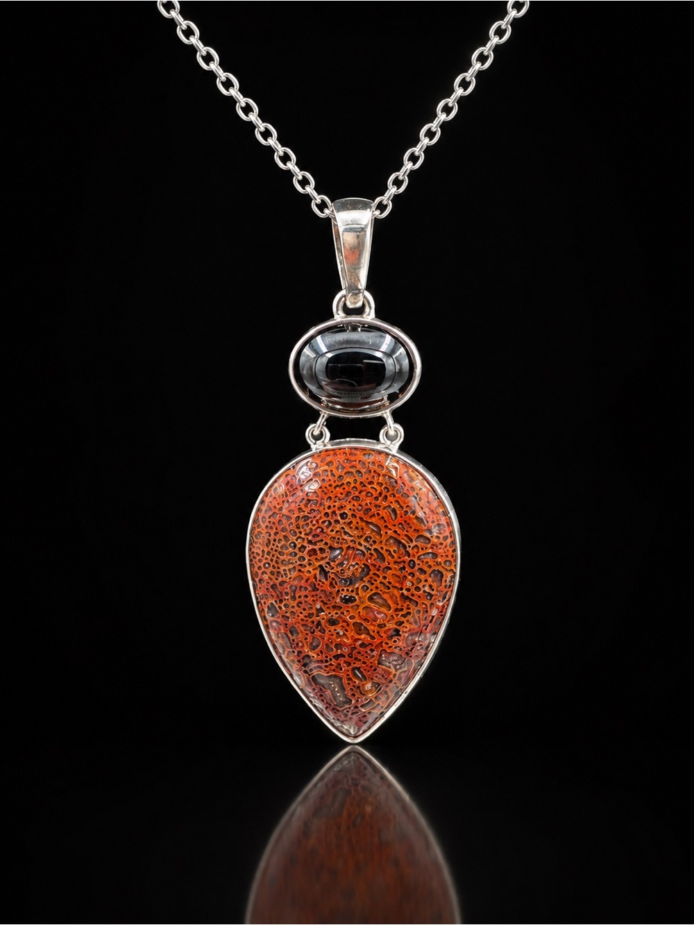 Beautiful Dino Bone Pendant encased in .925 Silver (Stainless Steel Chain incl)